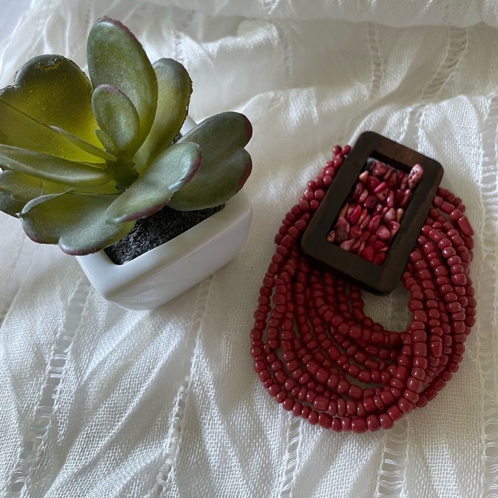 Multi stretchy strands with rectangular brown wood bar and red chips bracelet